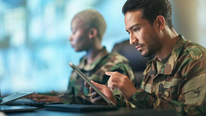 Asian man, army and tablet in research for military equipment, browsing or checking data at base. M