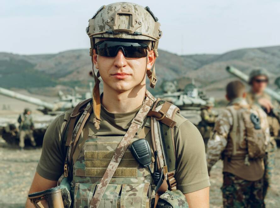 Soldier standing on polygon during military training